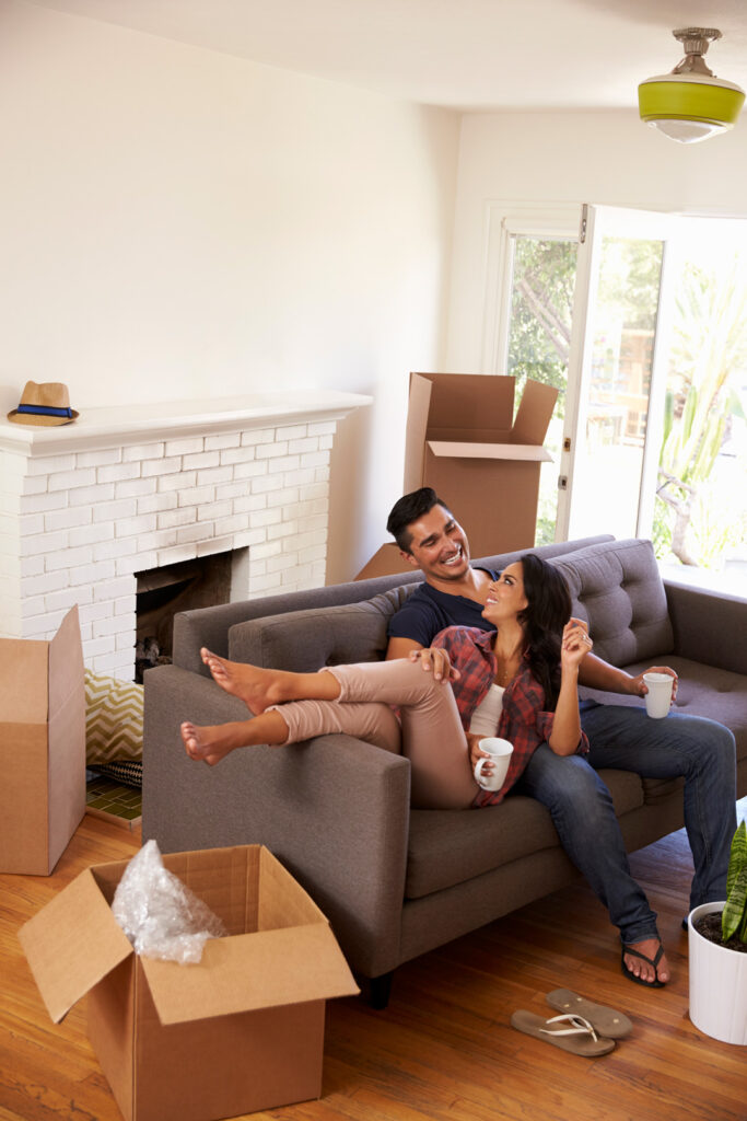 couple happy and relaxed in their home